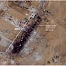 A satellite image over Gaza showing masses of people surrounding aid trucks on July 26.