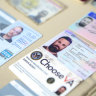 Venezuelan authorities show what they say are the ID cards of former US special forces citizen Airan Berry, right, and Luke Denman, left, in Caracas, Venezuela. 