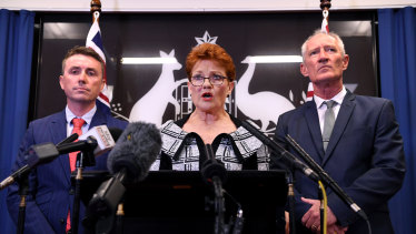 One Nation leader Pauline Hanson, flanked by party officials James Ashby (left) and Steve Dickson on Thursday.