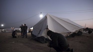 Palestinians set up tents near the Gaza Strip border with Israel on Sunday.
