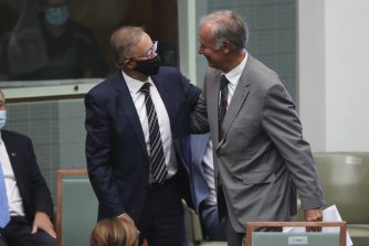 Opposition Leader Anthony Albanese congratulates retiring Liberal MP John Alexander. 