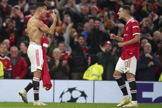 Cristiano Ronaldo, left, celebrates his stoppage-time winner with Manchester United teammate Diogo Dalot.
