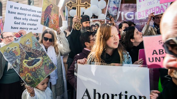 Anti-abortion campaigners protesting outside NSW Parliament on Tuesday.