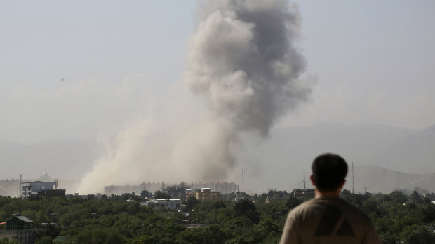 Smokes rises after a huge explosion in Kabul, Afghanistan, on Monday.