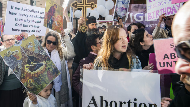 Anti-abortion campaigners protesting outside NSW Parliament on Tuesday.