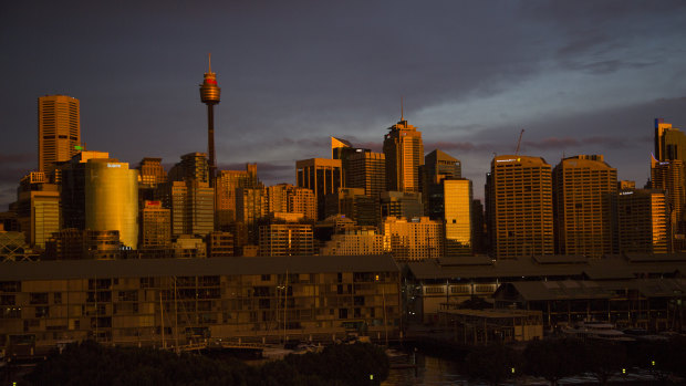 Golden dusk lights hits the CBD, as seen from the Herald's Pyrmont office.