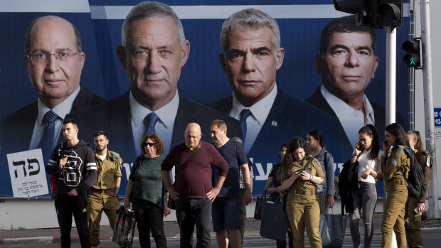 A Blue and White billboard showing, from left, Moshe Yaalon, Benny Gantz, Yair Lapid and Gabi Ashkenazi.