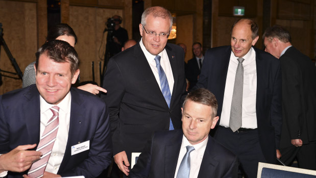 PM Scott Morrison (centre) is seen with Grant King (right) President of the BCA, and former NSW premier Mike Baird (left) at the Business Council of Australia 2018 Annual Dinner.