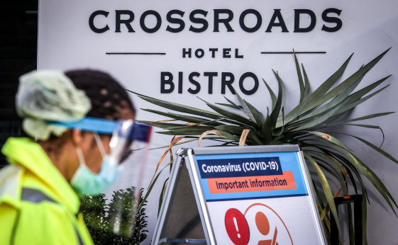 Medical staff at a pop-up COVID-19 testing clinic outside the Crossroads Hotel.