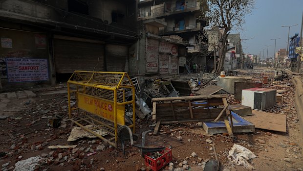 Burnt and vandalised buildings in New Delhi after clashes between Hindu and Muslim groups.