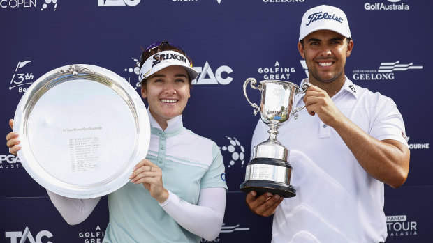 Hannah Green and Dimitrios Papadatos hold their trophies after winning The Open Qualifying Series, part of the Vic Open at 13th Beach.