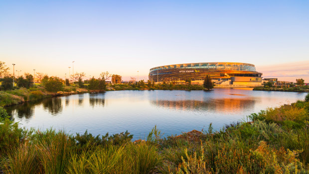 Optus Stadium's ground is under fire for being too hard.