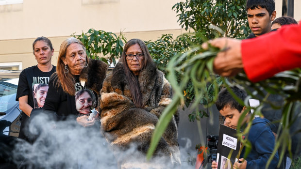 Donna Nelson, wrapped in possum fur, outside the inquest into her daughter’s death.