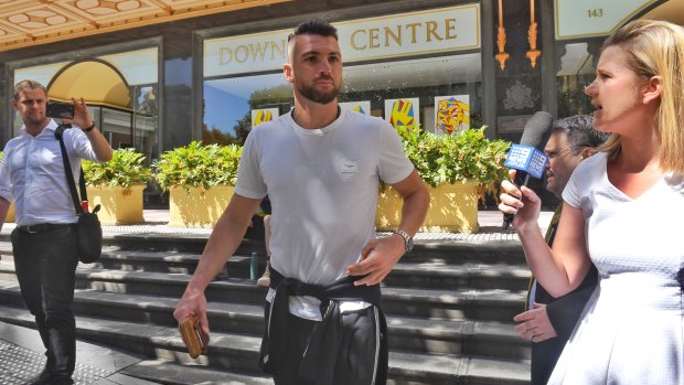 Long day: Marko Simic leaves Downing Centre in the morning.