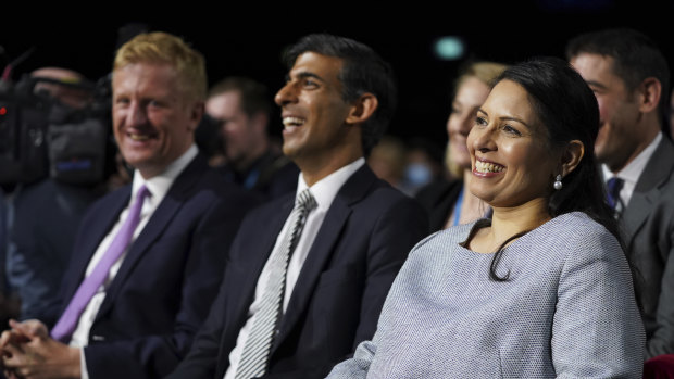 From right, British Home Secretary Priti Patel, Chancellor of the Exchequer Rishi Sunak and Oliver Dowden, minister without portfolio, listen to Prime Minister Boris Johnson’s keynote performance.