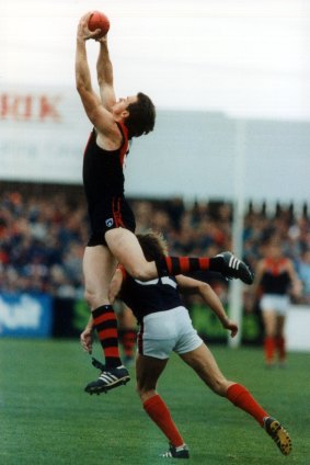 Anthony Daniher takes a flyer in 1991.