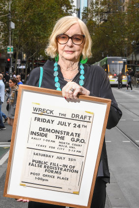 Jean McLean, convener of the Save Our Sons movement, holding a flyer promoting a rally and an event to fill-in false registration forms for National Service.