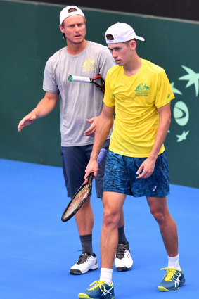 Close bond: Davis Cup coach Lleyton Hewitt (left) and Alex de Minaur.