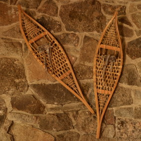 An antique pair of snowshoes on the wall of Moonbah’s Lake Hut near Jindabyne.