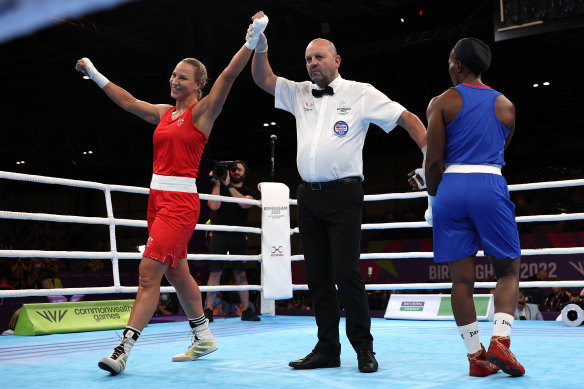 Kaye Scott (left) is another of the five Australian boxers in the medal mix in Birmingham.