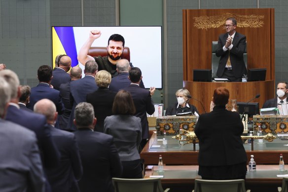 Ukraine President Volodymyr Zelensky receives a standing ovation after addressing federal Parliament.