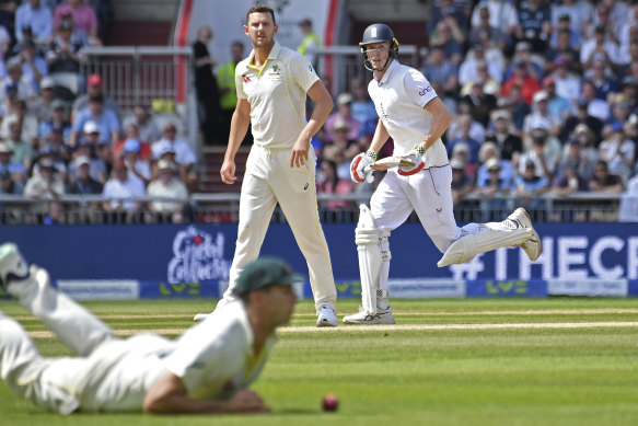 England’s Zak Crawley runs past Australia’s Josh Hazlewood after playing a shot.