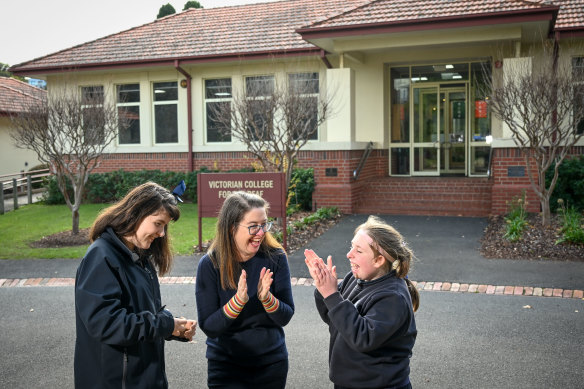 Victorian College for the Deaf school council president Gabrielle Quinlan with her daughter Zoe (left) and student Sophie.