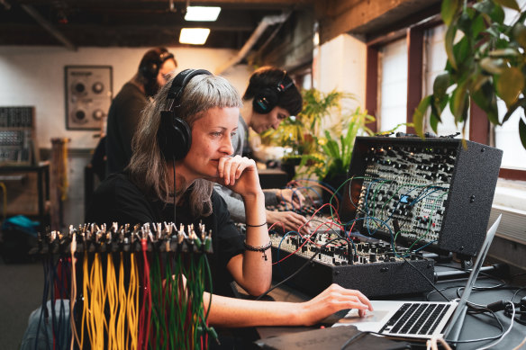 Members make music at MESS (Melbourne Electronic Sound Studio).