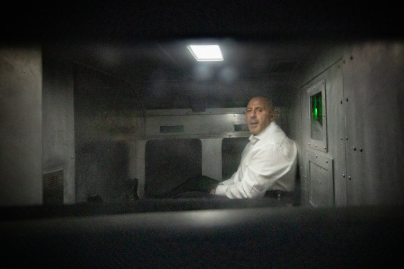 Jailed drug boss Tony Mokbel leaves the County Court in a prison van in February 2024.