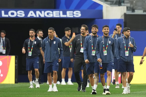 Iran’s players walk onto the pitch at Los Angeles Stadium for their matchday minus one familiarisation session.