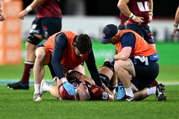 Queensland’s Connor Vest receives medical assistance after the May 2023 tackle that broke his neck.