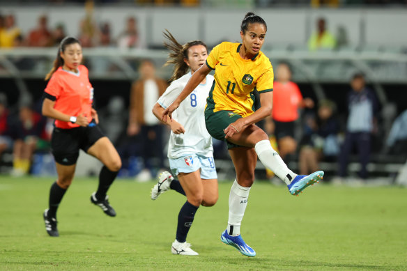 Mary Fowler takes a shot at a goal during the Olympic qualifier match between Australia and Taiwan.