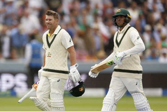 David Warner and Usman Khawaja walk off the field as rain delayed play on day one of the second Test at Lord’s.