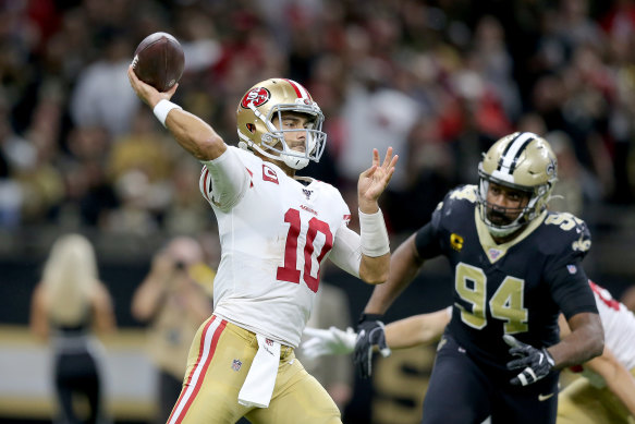 Jimmy Garoppolo throws a pass against the Saints.