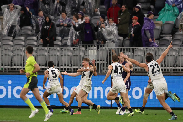 From the jaws of defeat: Jack Newnes celebrates his after-the-siren goal. 