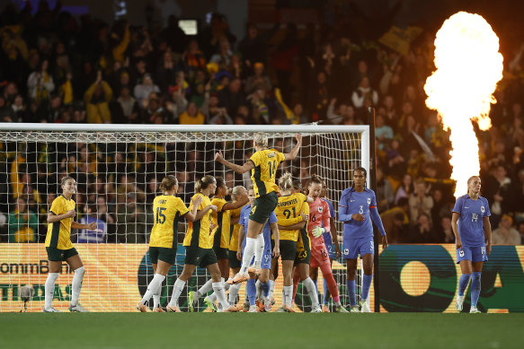 The Matildas celebrate their winning goal against France at Marvel Stadium in a World Cup warm-up game.