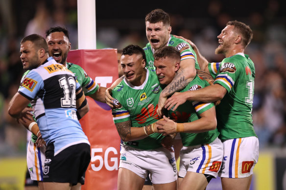 Jack Wighton celebrates a crucial try in Saturday's victory over the Sharks.