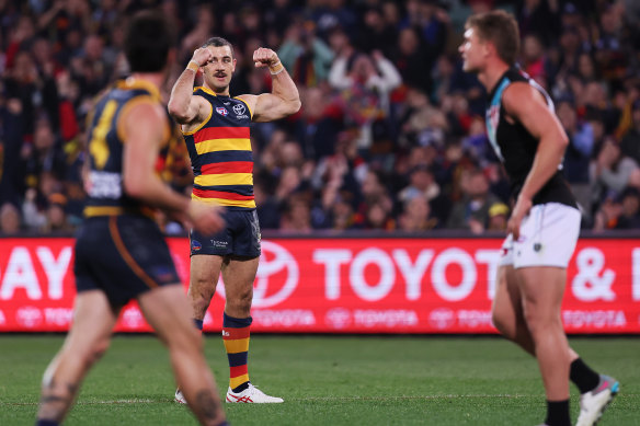 Taylor Walker of the Crows celebrates a goal.