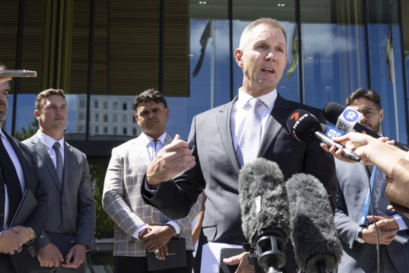 Canberra Raiders CEO Don Furner, with Jack Wighton and Latrell Mitchell, addresses media outside the court after charges against the NRL stars were dropped on Wednesday.
