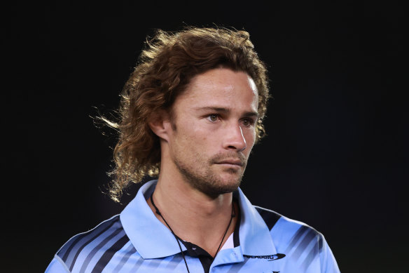 Nicho Hynes on the sidelines on Friday night as Cronulla had their final hit-out before the season starts in two weeks.