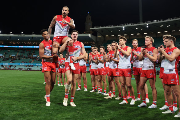 Lance Franklin is chaired off the SCG last night.