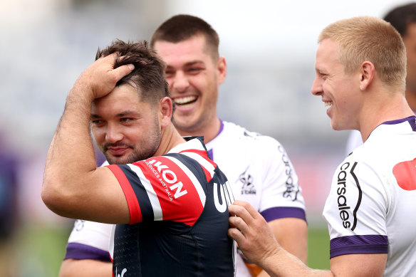 Brandon Smith with former Storm teammates after a trial match earlier this month.