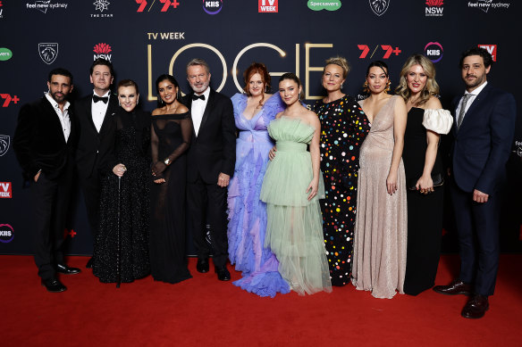 Sam Neill (fifth from left) and the cast of The Twelve on the red carpet. 
