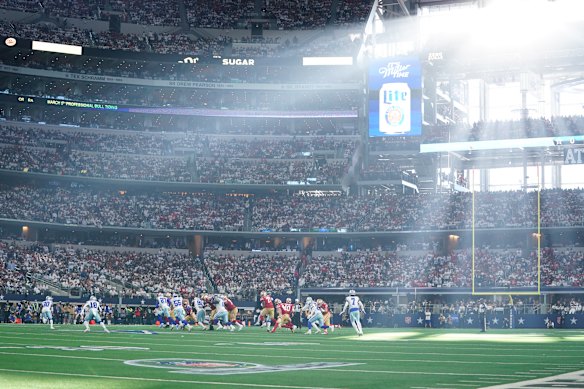 Sun shines onto the field of play during a clash between the Dallas Cowboys and the San Francisco 49ers.