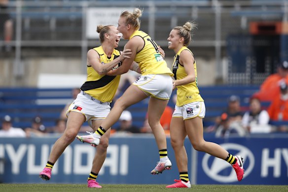 Courtney Wakefield celebrates a goal for the Tigers. 