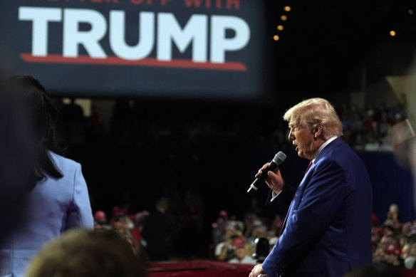 Donald Trump speaks during a town hall with former Democratic representative Tulsi Gabbard.