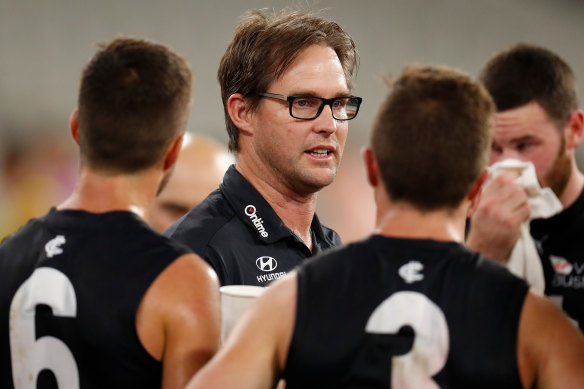 David Teague talks with his players during Carlton's opening-round clash with Richmond last month.