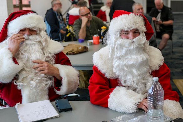 Back to school: at 31, Sam Hargreaves (right) was one of the youngest Santas in class last week.