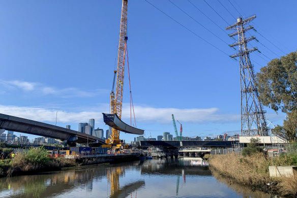 The West Gate Tunnel, pictured under construction last month, is among several big ticket projects billions of dollars over budget.