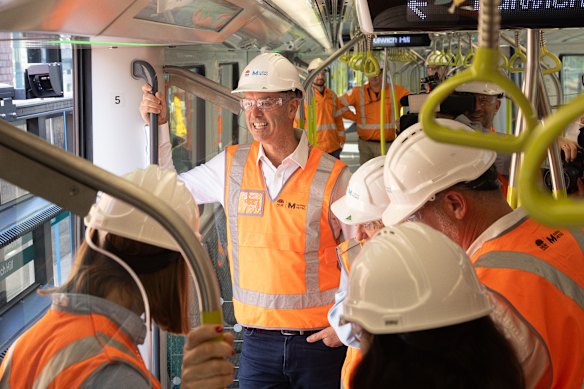 Transport Minister John Graham rides the metro train from Bankstown to Marrickville on Tuesday.